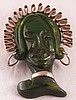 BP44 green bakelite headdress face pin